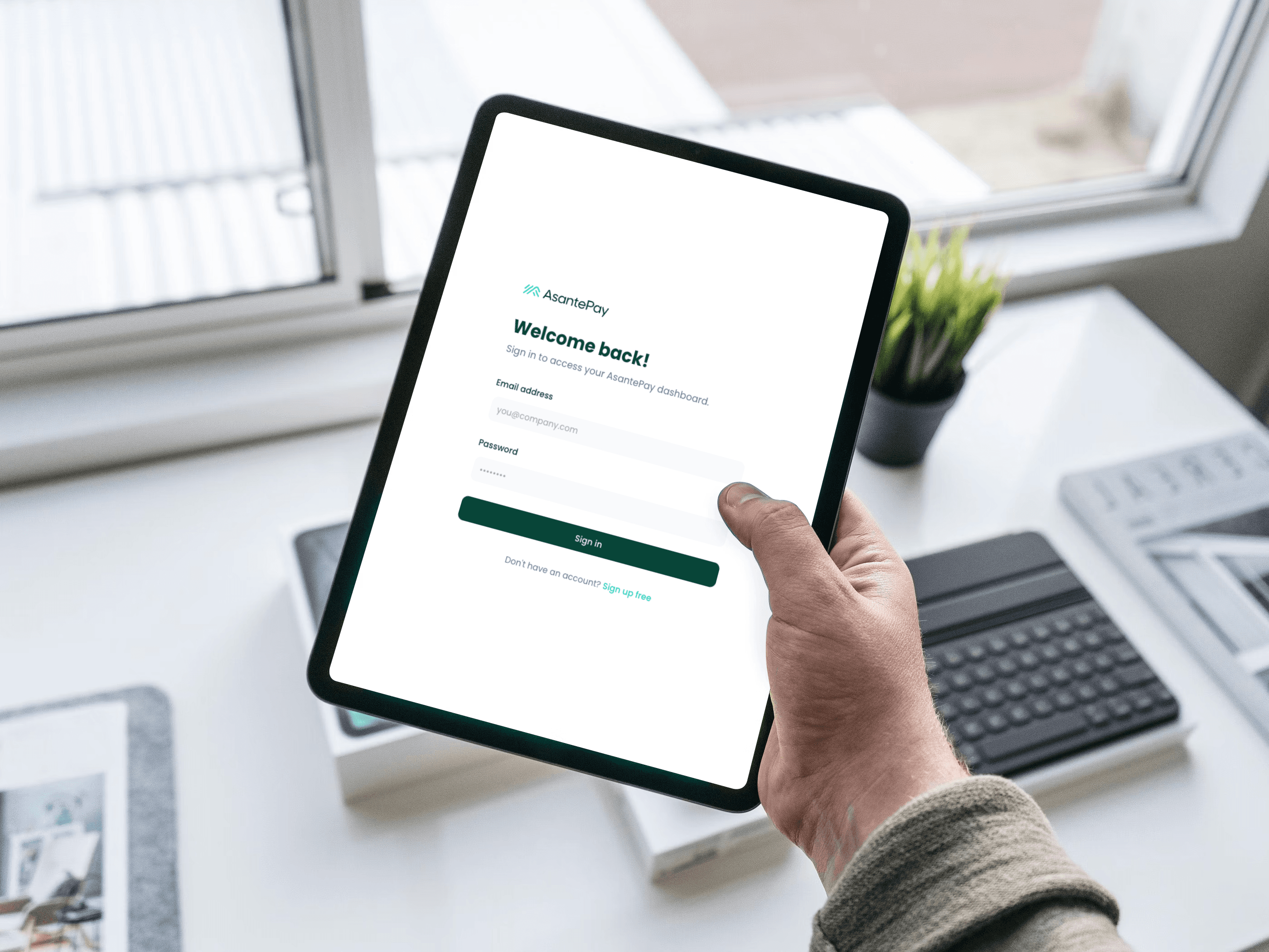Tablet showing AsantePay login interface